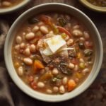 Rustic bowl of Tuscan white bean soup with creamy cannellini beans