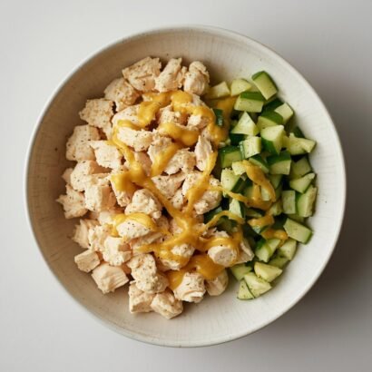 A bowl of creamy chicken salad made with chopped cooked chicken
